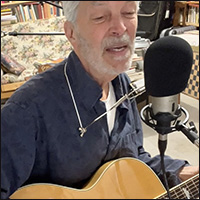 Jonathan Ochshorn playing guitar